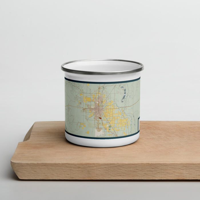 Front View Custom Roswell New Mexico Map Enamel Mug in Woodblock on Cutting Board