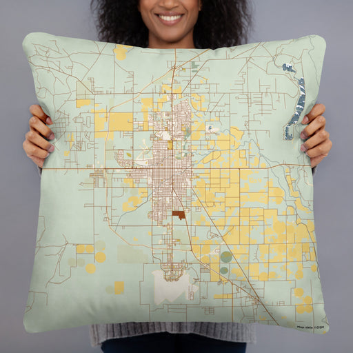 Person holding 22x22 Custom Roswell New Mexico Map Throw Pillow in Woodblock