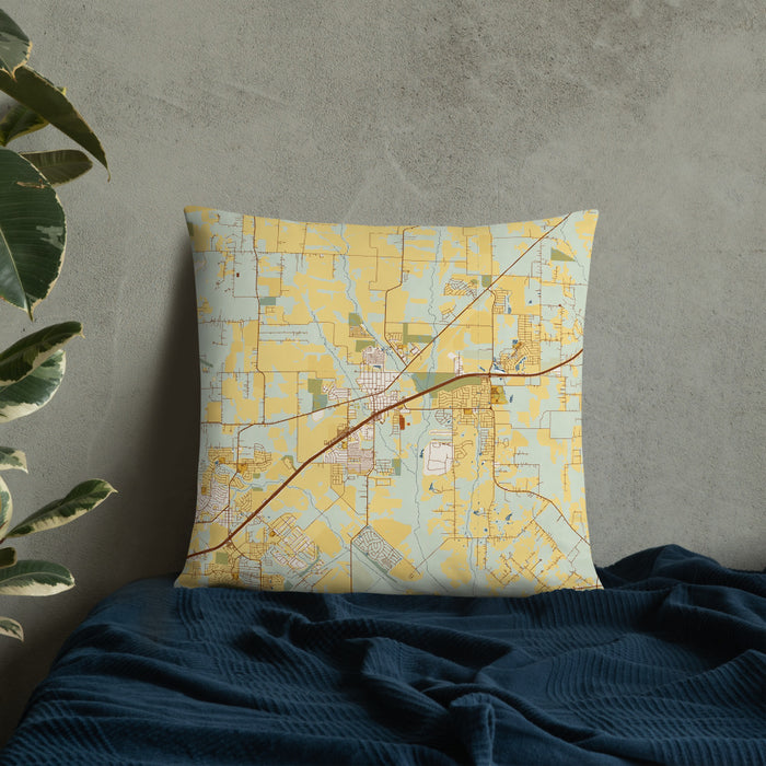 Custom Royse City Texas Map Throw Pillow in Woodblock on Bedding Against Wall