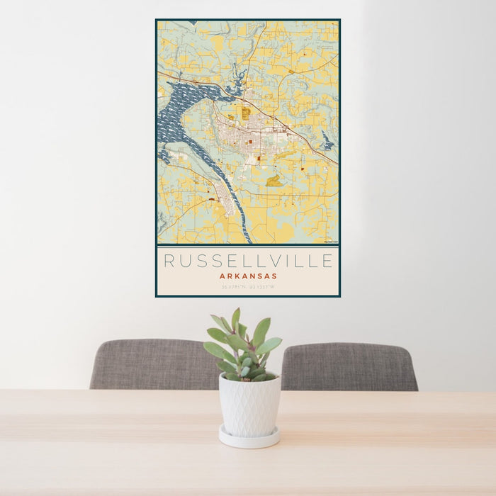 24x36 Russellville Arkansas Map Print Portrait Orientation in Woodblock Style Behind 2 Chairs Table and Potted Plant
