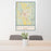 24x36 Rutland Vermont Map Print Portrait Orientation in Woodblock Style Behind 2 Chairs Table and Potted Plant
