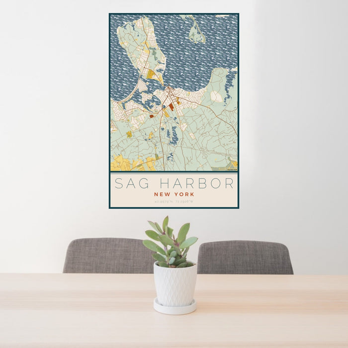 24x36 Sag Harbor New York Map Print Portrait Orientation in Woodblock Style Behind 2 Chairs Table and Potted Plant