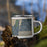 Right View Custom Sag Harbor New York Map Enamel Mug in Afternoon on Grass With Trees in Background