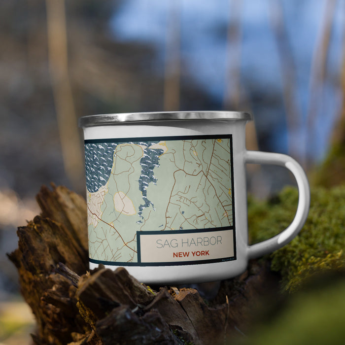 Right View Custom Sag Harbor New York Map Enamel Mug in Woodblock on Grass With Trees in Background