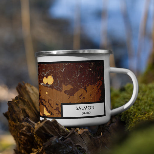 Right View Custom Salmon Idaho Map Enamel Mug in Ember on Grass With Trees in Background