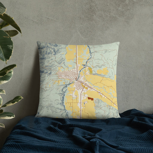 Custom Salmon Idaho Map Throw Pillow in Woodblock on Bedding Against Wall