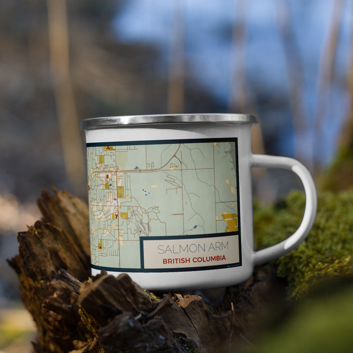 Right View Custom Salmon Arm British Columbia Map Enamel Mug in Woodblock on Grass With Trees in Background