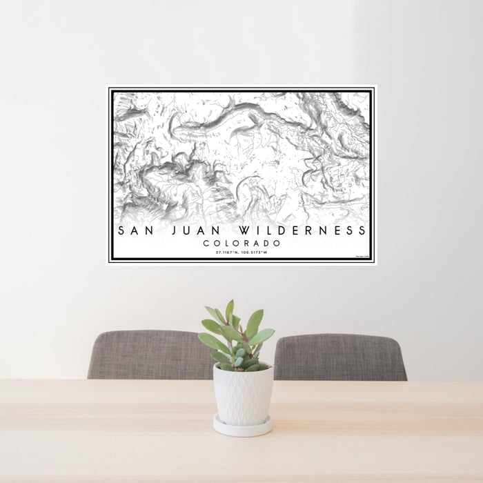 24x36 San Juan Wilderness Colorado Map Print Lanscape Orientation in Classic Style Behind 2 Chairs Table and Potted Plant