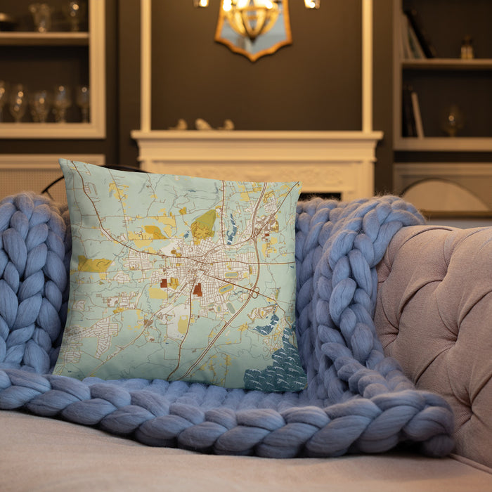 Custom Saratoga Springs New York Map Throw Pillow in Woodblock on Cream Colored Couch