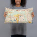 Person holding 20x12 Custom Savage Minnesota Map Throw Pillow in Woodblock