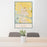 24x36 Scottsbluff Nebraska Map Print Portrait Orientation in Woodblock Style Behind 2 Chairs Table and Potted Plant