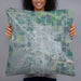 Person holding 22x22 Custom Scottsbluff Nebraska Map Throw Pillow in Afternoon