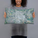 Person holding 20x12 Custom Scottsbluff Nebraska Map Throw Pillow in Afternoon