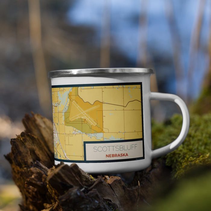 Right View Custom Scottsbluff Nebraska Map Enamel Mug in Woodblock on Grass With Trees in Background