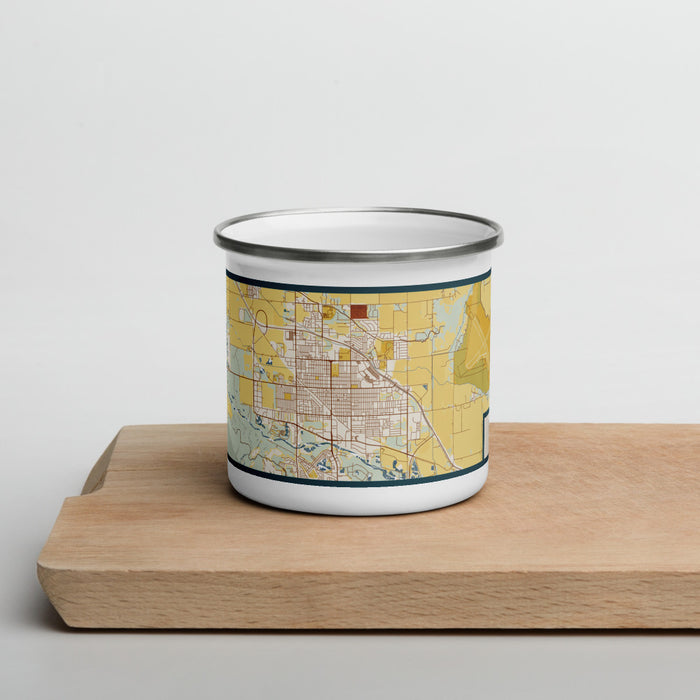 Front View Custom Scottsbluff Nebraska Map Enamel Mug in Woodblock on Cutting Board