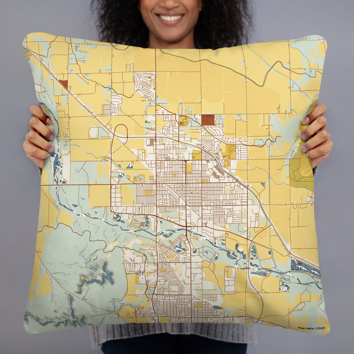 Person holding 22x22 Custom Scottsbluff Nebraska Map Throw Pillow in Woodblock