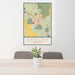 24x36 Shelby Montana Map Print Portrait Orientation in Woodblock Style Behind 2 Chairs Table and Potted Plant