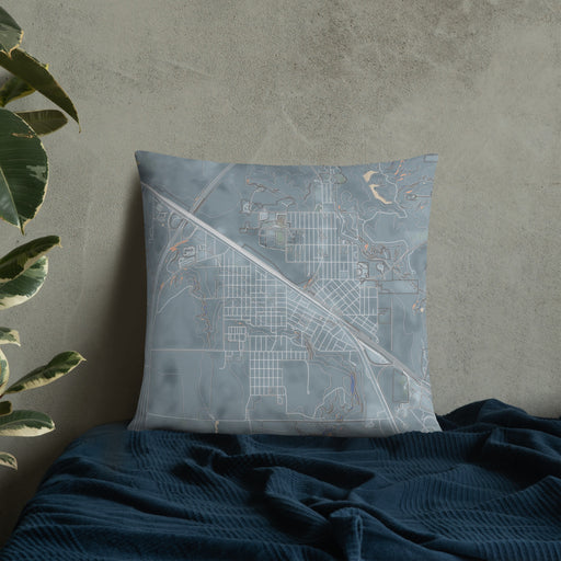 Custom Shelby Montana Map Throw Pillow in Afternoon on Bedding Against Wall