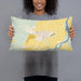 Person holding 20x12 Custom Sidney Montana Map Throw Pillow in Woodblock