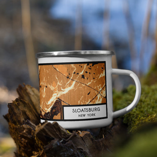 Right View Custom Sloatsburg New York Map Enamel Mug in Ember on Grass With Trees in Background