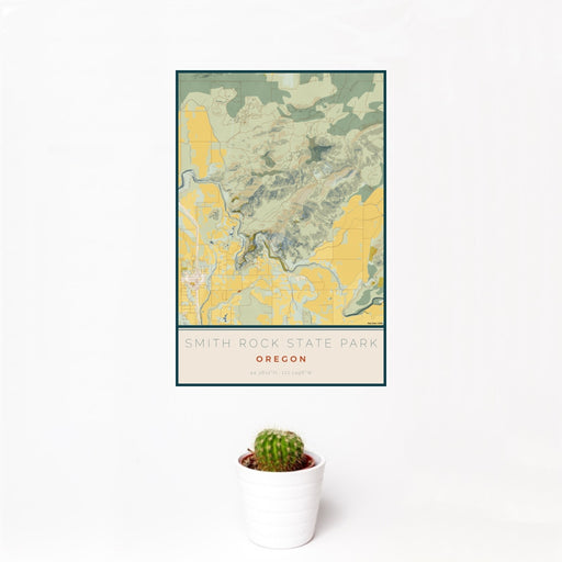 12x18 Smith Rock State Park Oregon Map Print Portrait Orientation in Woodblock Style With Small Cactus Plant in White Planter