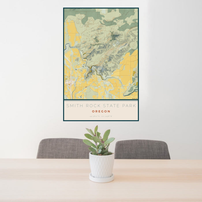 24x36 Smith Rock State Park Oregon Map Print Portrait Orientation in Woodblock Style Behind 2 Chairs Table and Potted Plant