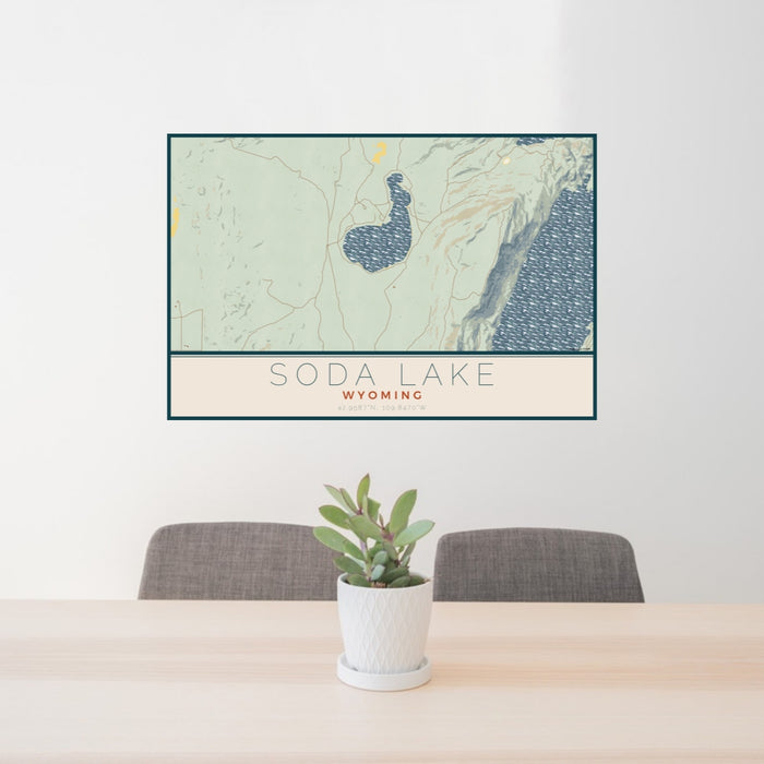 24x36 Soda Lake Wyoming Map Print Lanscape Orientation in Woodblock Style Behind 2 Chairs Table and Potted Plant