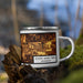 Right View Custom South Saint Paul Minnesota Map Enamel Mug in Ember on Grass With Trees in Background