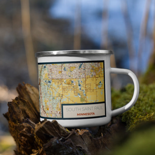 Right View Custom South Saint Paul Minnesota Map Enamel Mug in Woodblock on Grass With Trees in Background