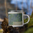 Right View Custom Springfield Missouri Map Enamel Mug in Afternoon on Grass With Trees in Background