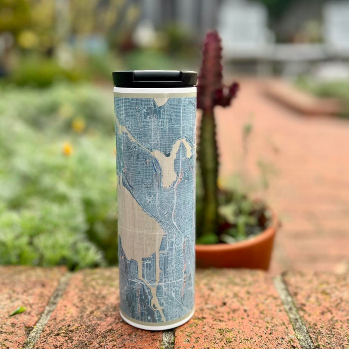 17oz Stainless Steel Insulated Tumbler in White with Custom Afternoon Style Lying on Ground Next to Flowers