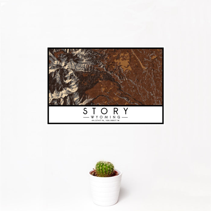 12x18 Story Wyoming Map Print Landscape Orientation in Ember Style With Small Cactus Plant in White Planter