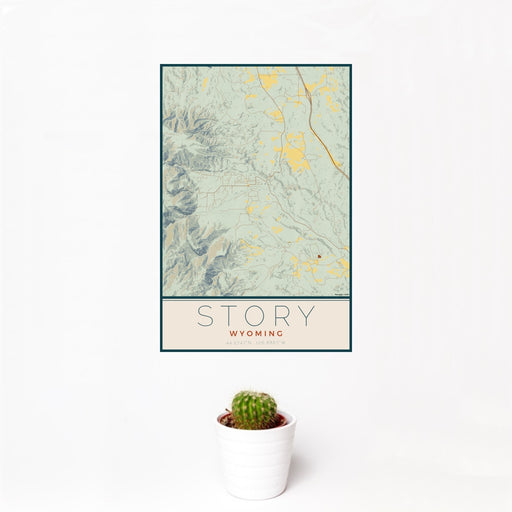 12x18 Story Wyoming Map Print Portrait Orientation in Woodblock Style With Small Cactus Plant in White Planter