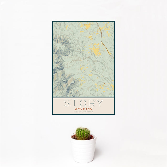 12x18 Story Wyoming Map Print Portrait Orientation in Woodblock Style With Small Cactus Plant in White Planter