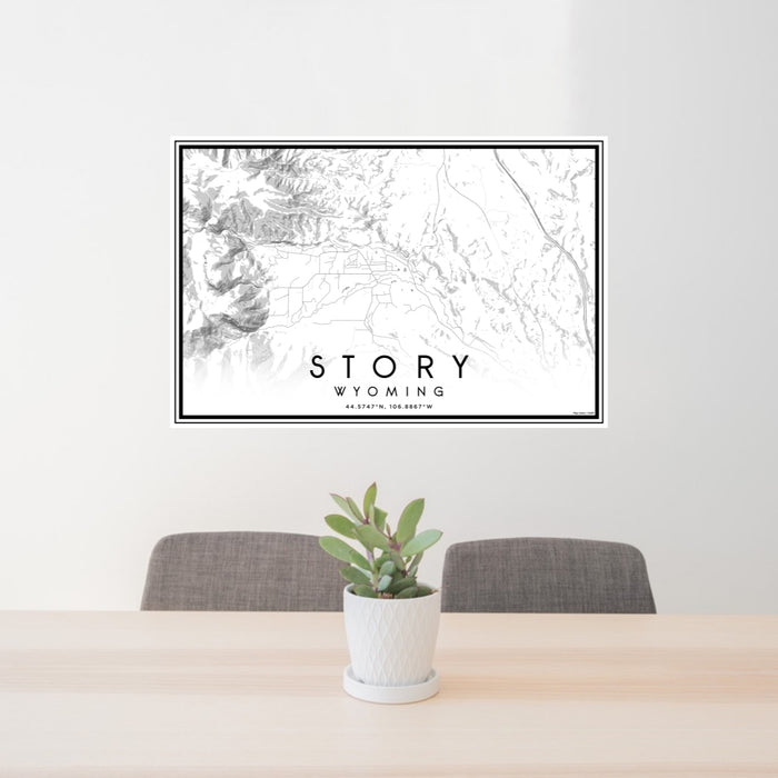 24x36 Story Wyoming Map Print Landscape Orientation in Classic Style Behind 2 Chairs Table and Potted Plant