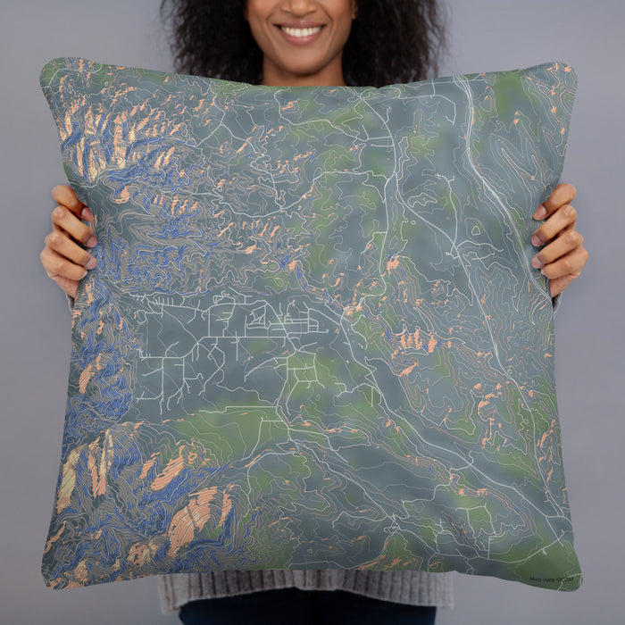 Person holding 22x22 Custom Story Wyoming Map Throw Pillow in Afternoon