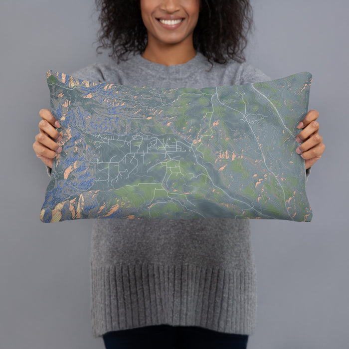 Person holding 20x12 Custom Story Wyoming Map Throw Pillow in Afternoon