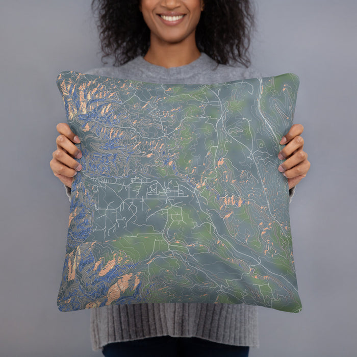 Person holding 18x18 Custom Story Wyoming Map Throw Pillow in Afternoon