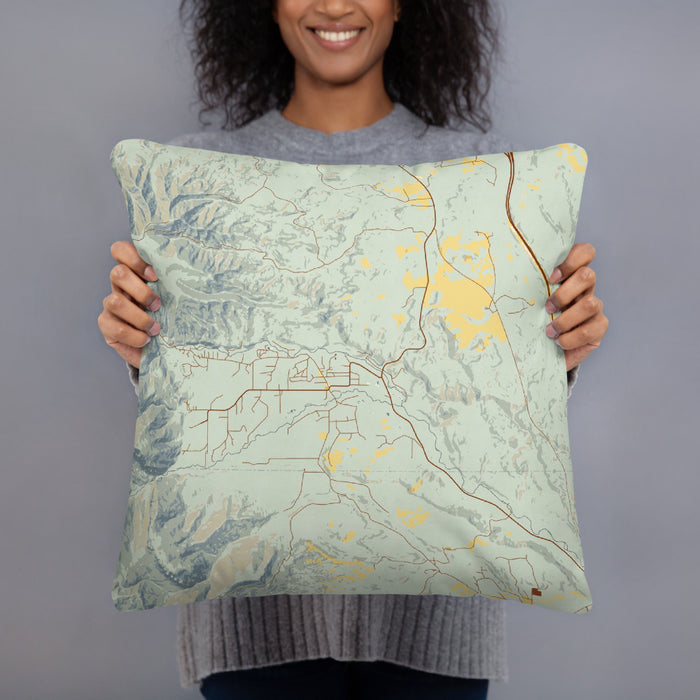 Person holding 18x18 Custom Story Wyoming Map Throw Pillow in Woodblock