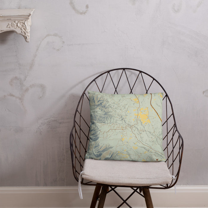 Custom Story Wyoming Map Throw Pillow in Woodblock on Cream Colored Couch