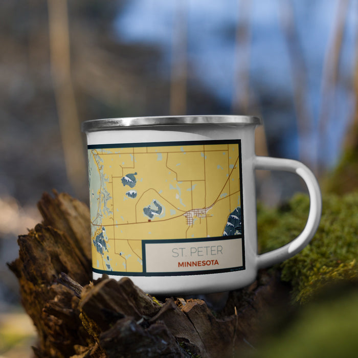 Right View Custom St. Peter Minnesota Map Enamel Mug in Woodblock on Grass With Trees in Background