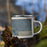 Right View Custom Susanville California Map Enamel Mug in Afternoon on Grass With Trees in Background