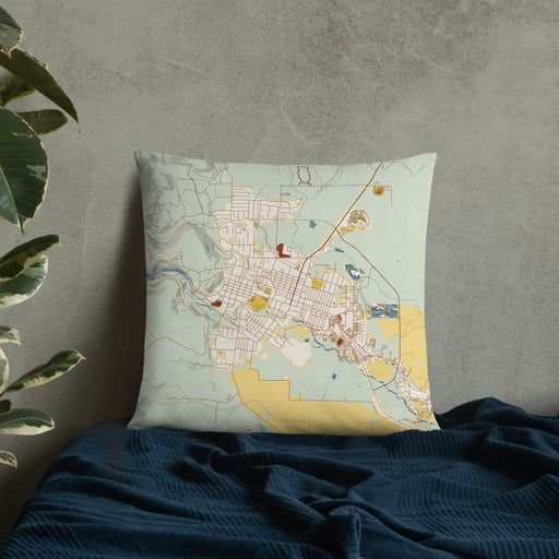 Custom Susanville California Map Throw Pillow in Woodblock on Bedding Against Wall