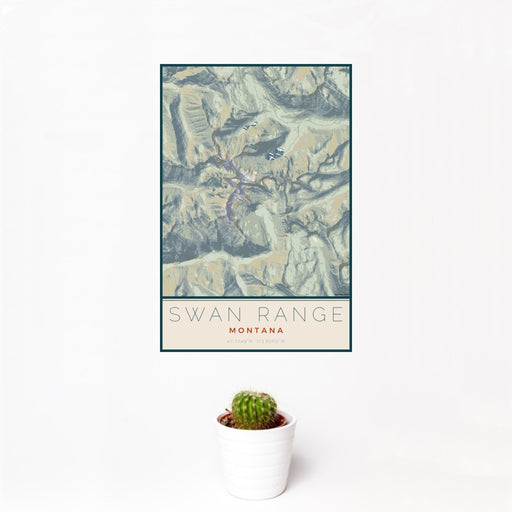 12x18 Swan Range Montana Map Print Portrait Orientation in Woodblock Style With Small Cactus Plant in White Planter