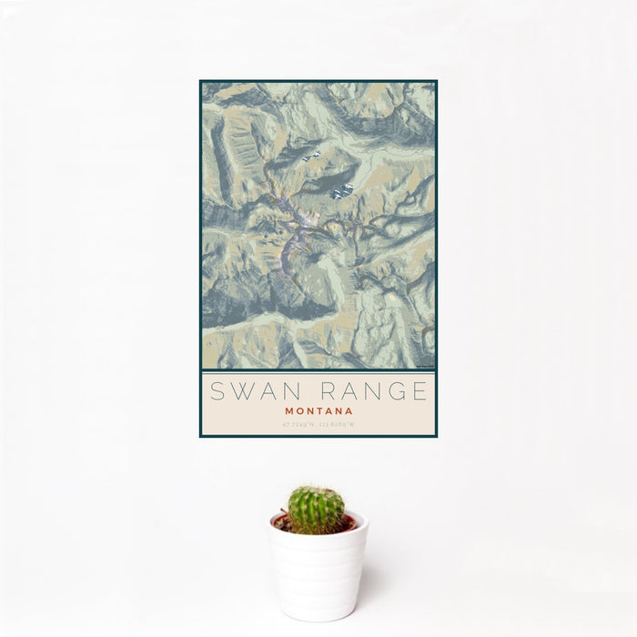 12x18 Swan Range Montana Map Print Portrait Orientation in Woodblock Style With Small Cactus Plant in White Planter