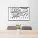 24x36 Swan Range Montana Map Print Lanscape Orientation in Classic Style Behind 2 Chairs Table and Potted Plant