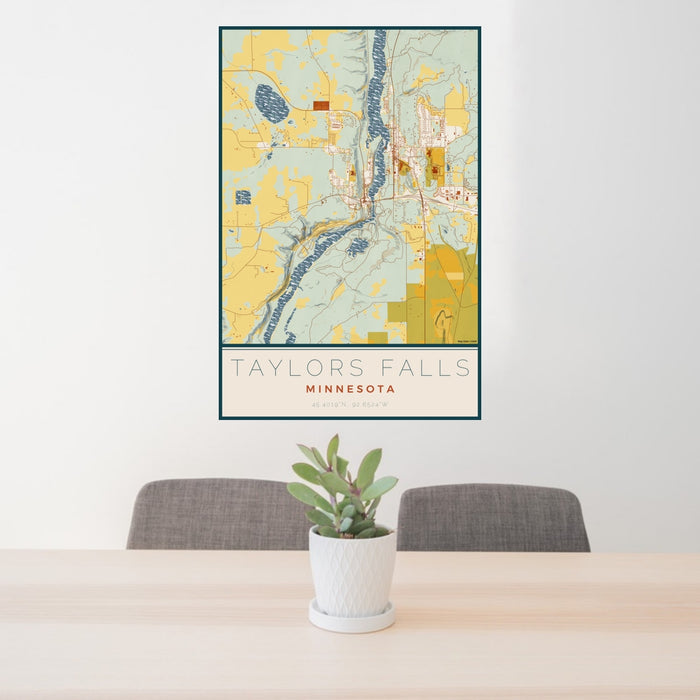 24x36 Taylors Falls Minnesota Map Print Portrait Orientation in Woodblock Style Behind 2 Chairs Table and Potted Plant