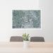 24x36 The Villages Florida Map Print Lanscape Orientation in Afternoon Style Behind 2 Chairs Table and Potted Plant
