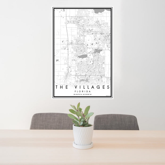 24x36 The Villages Florida Map Print Portrait Orientation in Classic Style Behind 2 Chairs Table and Potted Plant