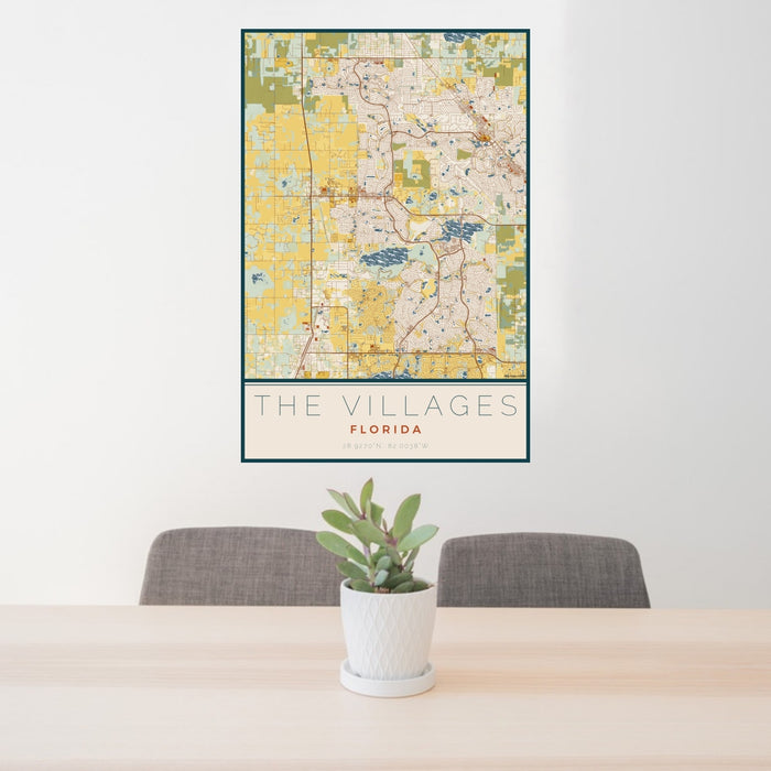 24x36 The Villages Florida Map Print Portrait Orientation in Woodblock Style Behind 2 Chairs Table and Potted Plant